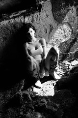 beautiful sad girl posing in devastated construction