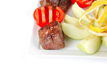 red meat on white dish