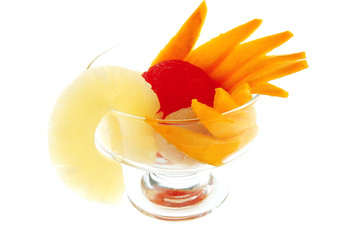 Obraz na płótnie Canvas small glass cup and fruits