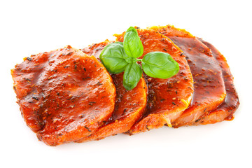 raw juicy steaks over white background
