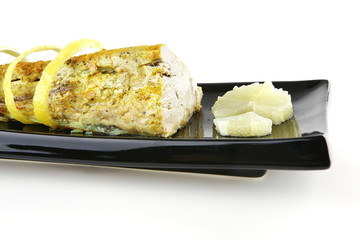 tuna chunk served with lemon
