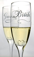 Bride and groom glasses with champagne
