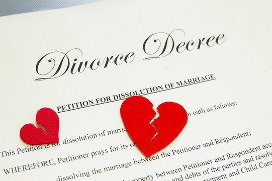 small broken red hearts on divorce papers