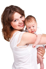 Mother holding her adorable baby