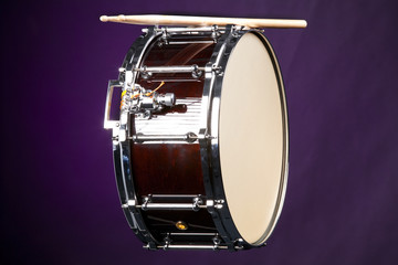 Fototapeta na wymiar Wine Snare Drum Isolated on Purple