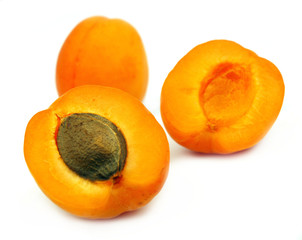 Fresh apricots on white background