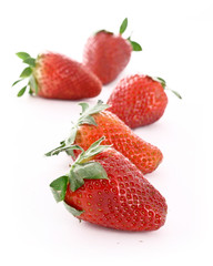 Few strawberries isolated on white