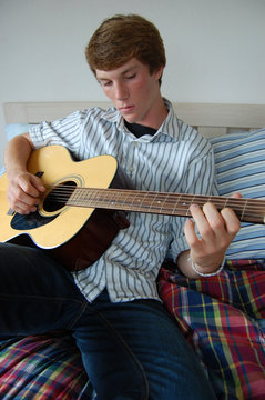 Young Man Playing Guitar