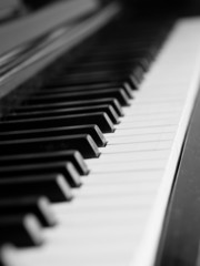 Piano keys of a very well loved and often played piano