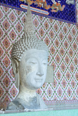 the statue head of buddha image in thai temple