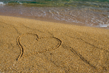 Fototapeta na wymiar Heart in the sand.