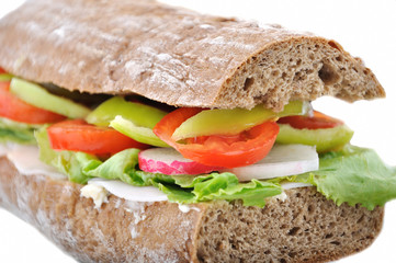 diet brown baguette with vegetable on white background