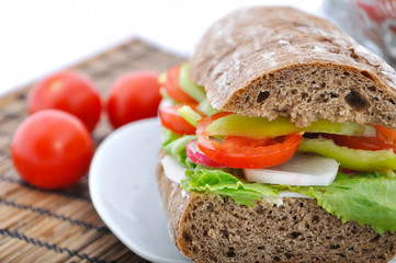 diet brown baguette with vegetable