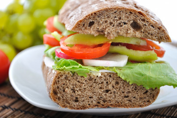 diet brown baguette with vegetable