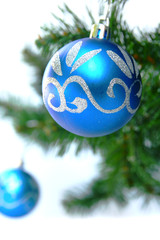 Blue bauble in tree