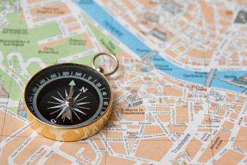 Compass on map of Italian Rome