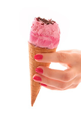Strawberry ice cream with chocolate in a sugar cone on white bac