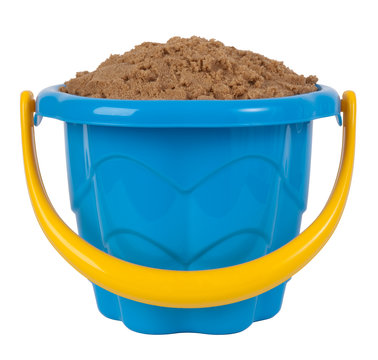 Plastic bucket full of sand