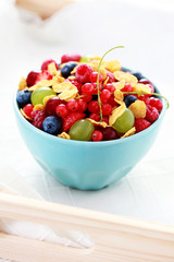 bowl of fruits with cereals