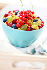 bowl of fruits with cereals