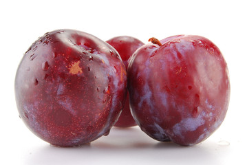 Plums isolated on white