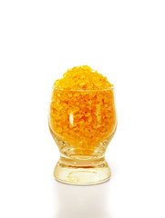 Fragranced sea salt in a glass.