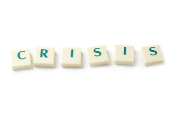 crisis word from scrabble letters isolated on white