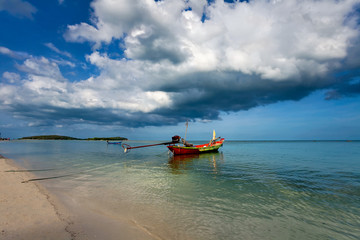 Tropical beach under blue sky. Thailand