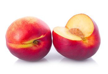 Fresh peach fruits with cut isolated