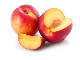 Fototapeta na wymiar Fresh peach fruits with cut isolated