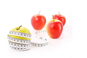 Apples and a measure tape, diet concept
