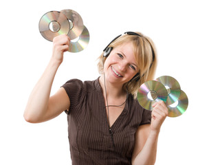 happy woman listening music with cds in the hands