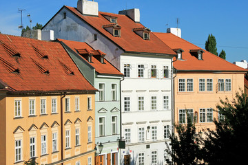 Fototapeta na wymiar Beautiful Czech colorful houses in blue sky