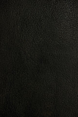 Old aged natural dark black vintage fine full grain genuine leather texture pattern, large detailed vertical textured background macro closeup