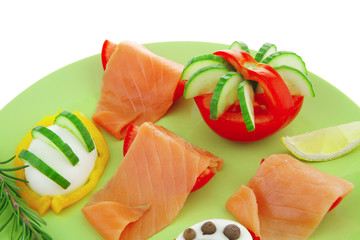 smoked salmon slices on green