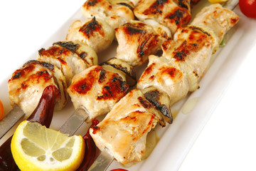 roasted pork kebab on white