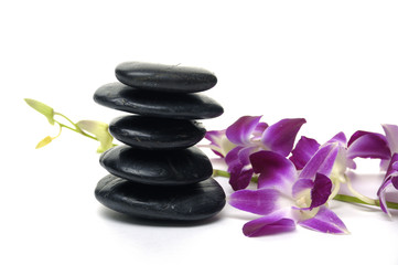 Spa essentials-orchid with pyramid of stones