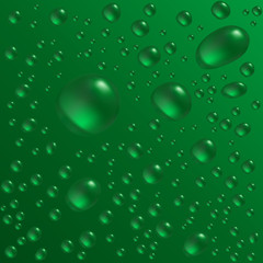Water drops are on the green surface.