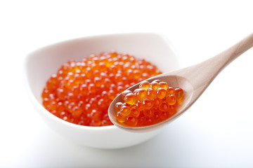 red caviar on the spoon