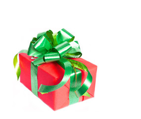 Gift box with green ribbon and a rose isolated on a white backgr