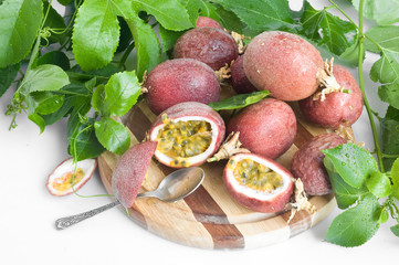 fresh ripe passiflora with leaves