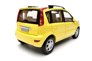 Generic modern yellow family car model on a white background