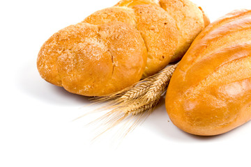 Fresh bread with ears of wheat
