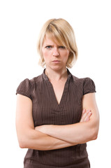 annoyed blond woman with crossed arms isolated on white