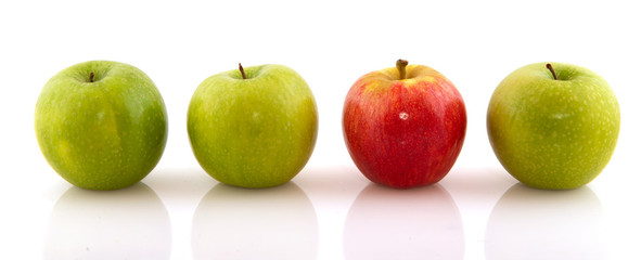 Green apples with one red one