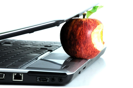 Laptop biting apple