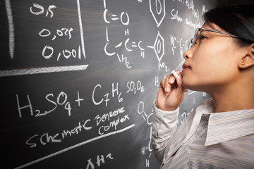 Female student working on equation