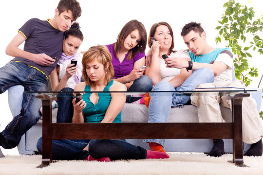 group of teenage  with cellphones
