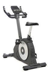 Stationary bike, gym machine over white background