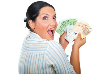 Excited winner woman with money